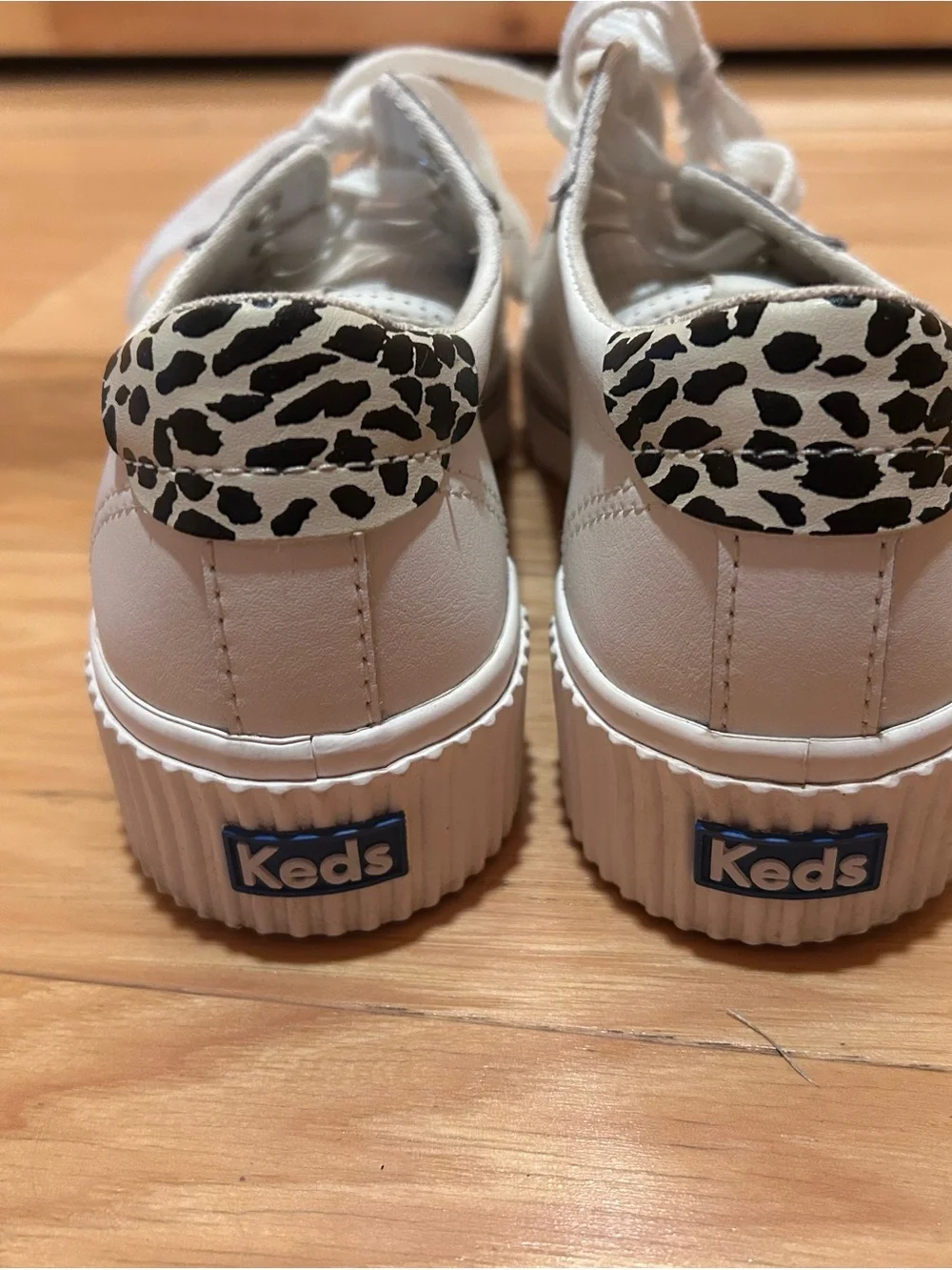 Keds White Sneakers with Gold Accents and Leopard Insole